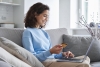 Woman shopping online from home